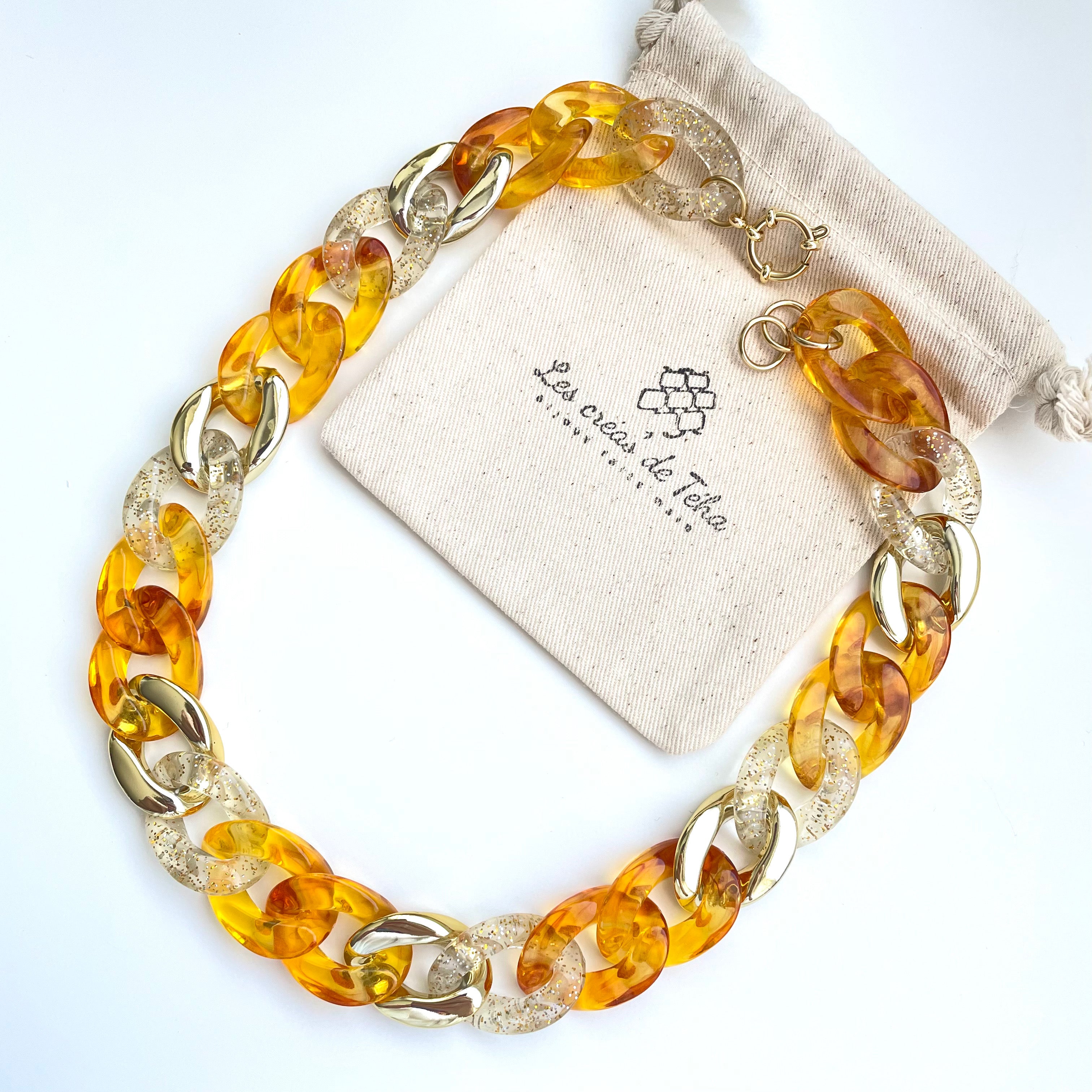 Collier en grosses mailles en acrylique et acier inoxydable et doré