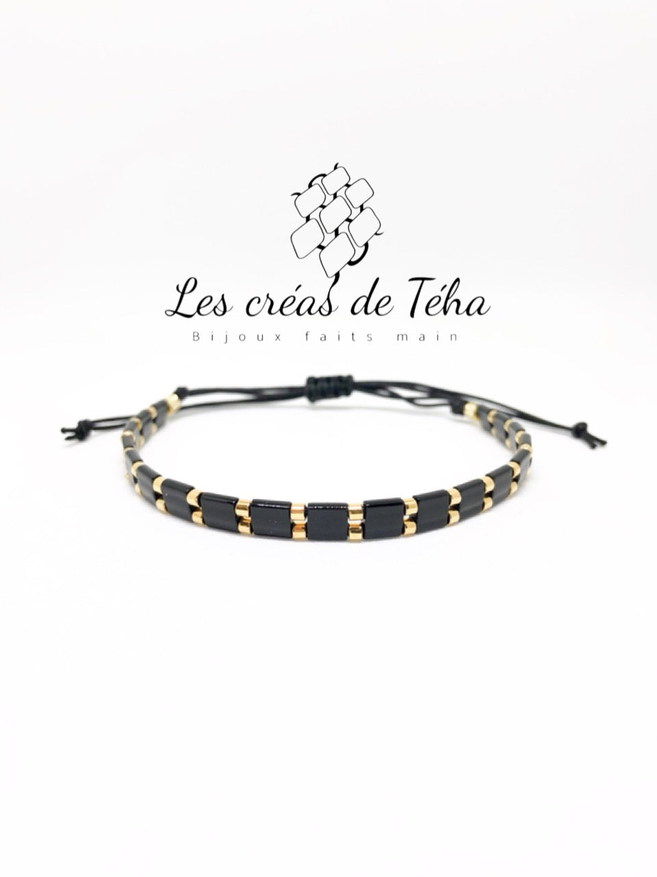 Bracelet Huira noir et doré en perles de verre et cordon