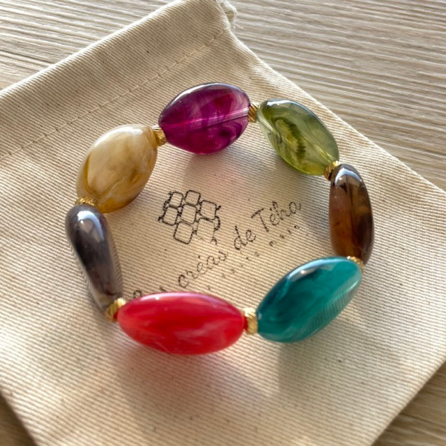 Bracelet élastique en perles acrylique et acier inoxydable modèle Joia