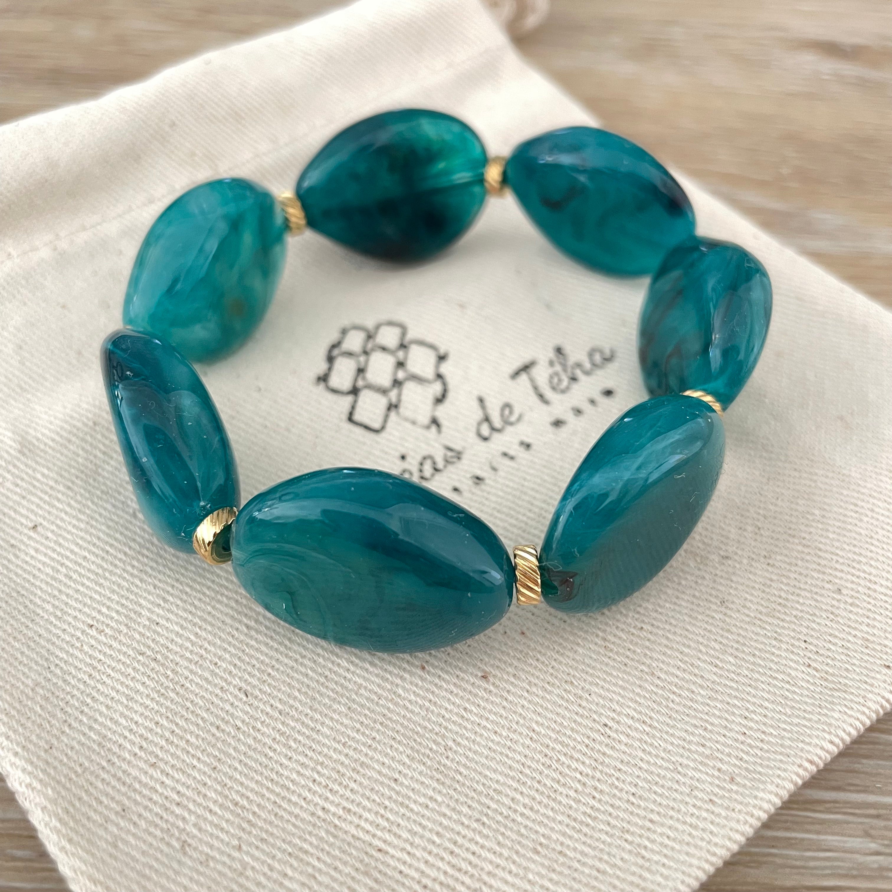 Bracelet élastique en perles acrylique et acier inoxydable modèle Joia