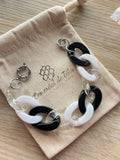 Bracelet tendance grosses noir, blanc, paillettes argentées modèle Ohea