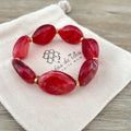 Bracelet élastique en perles acrylique et acier inoxydable modèle Joia