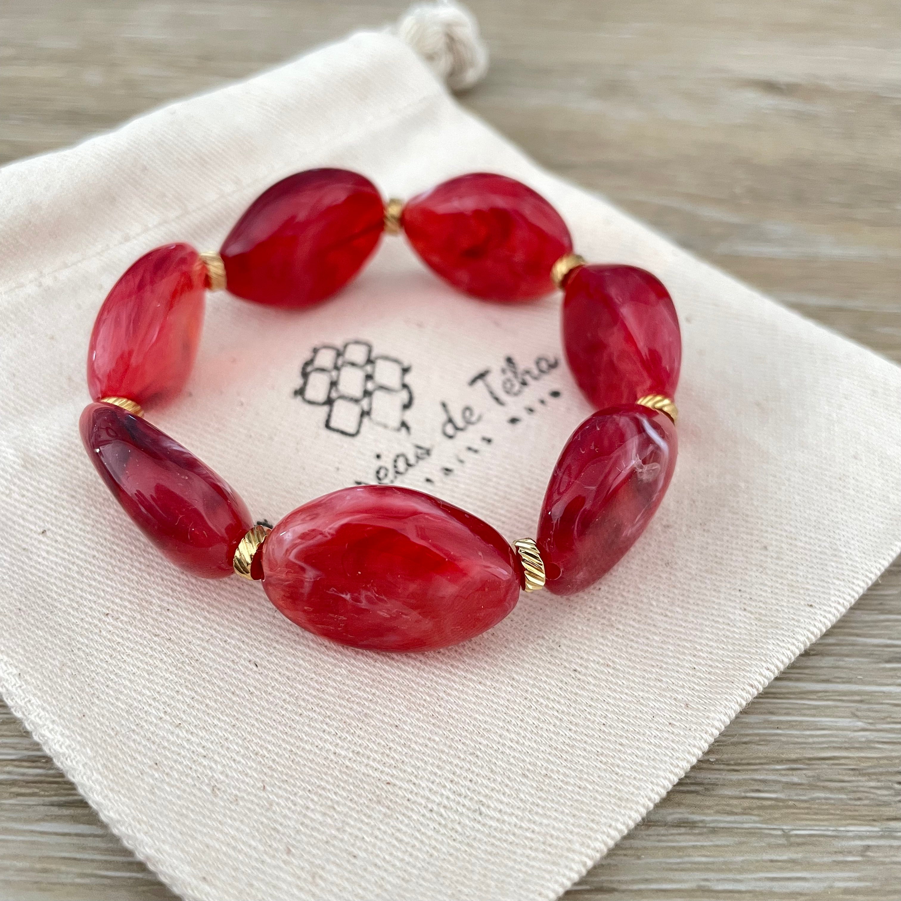Bracelet élastique en perles acrylique et acier inoxydable modèle Joia