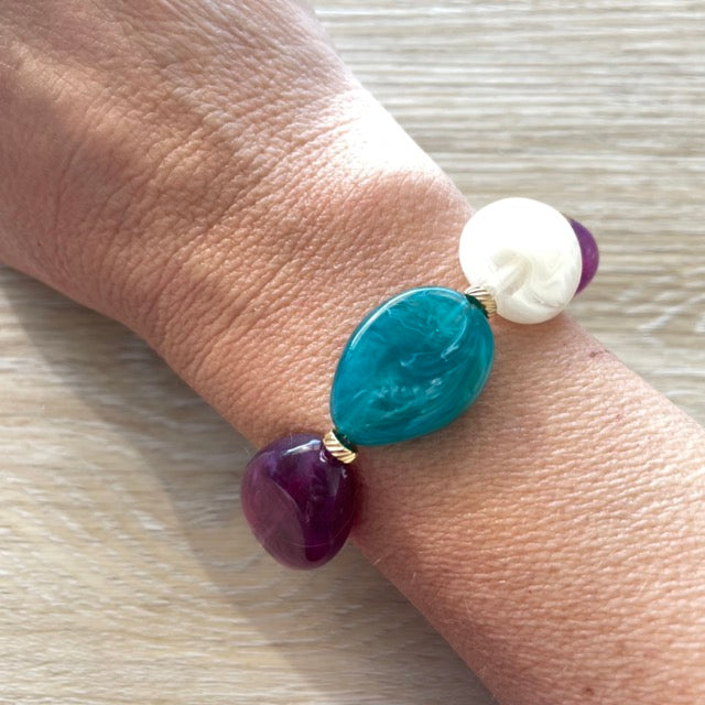 Bracelet élastique en perles acrylique et acier inoxydable modèle Joia