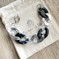 Bracelet tendance grosses mailles noir marbré, blanc et argenté modèle Ohéa