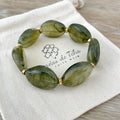 Bracelet élastique en perles acrylique et acier inoxydable modèle Joia