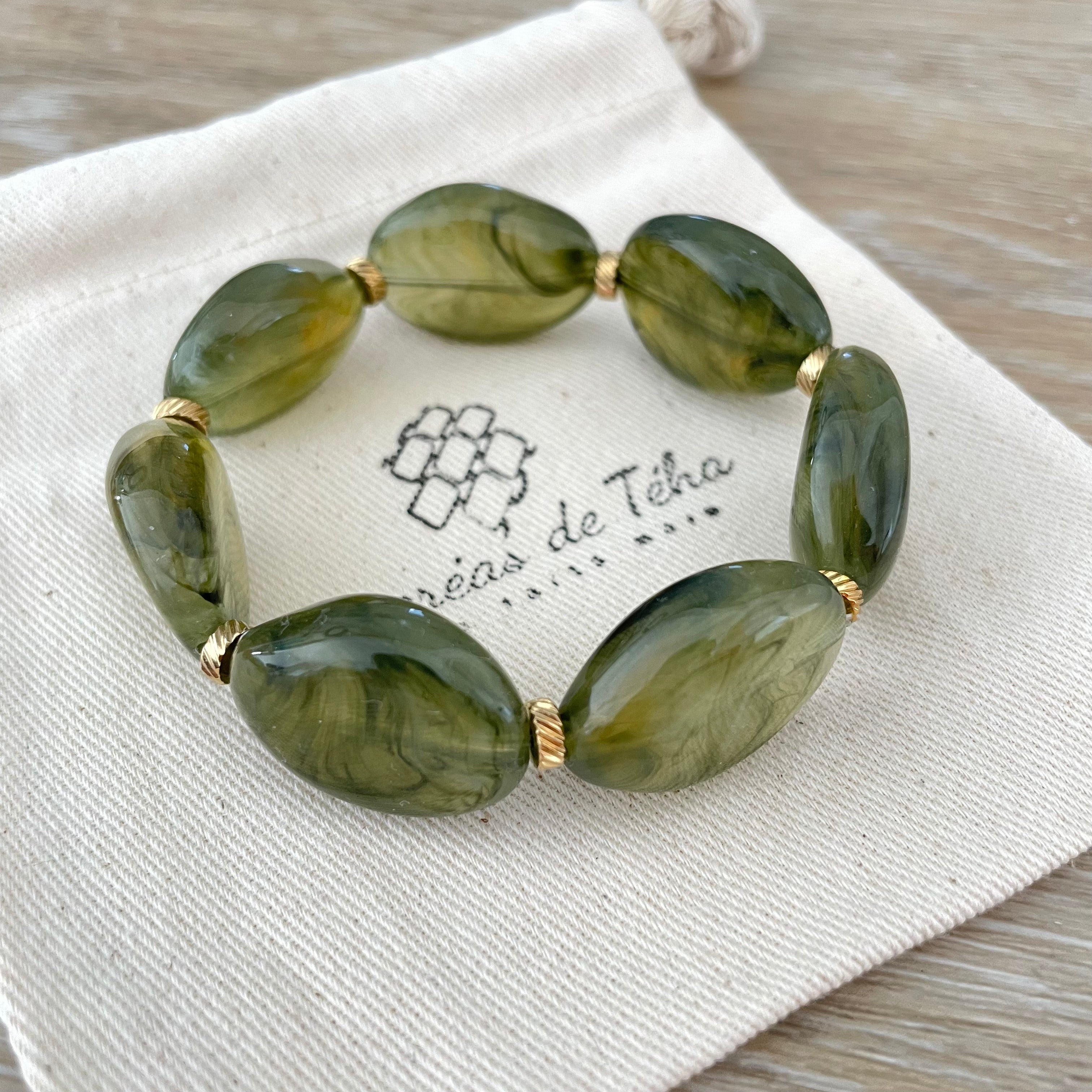 Bracelet élastique en perles acrylique et acier inoxydable modèle Joia