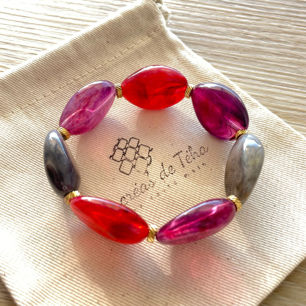 Bracelet élastique en perles acrylique et acier inoxydable modèle Joia