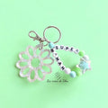 Porte-clés bijou de sac avec breloque fleur en résine modèle Flower