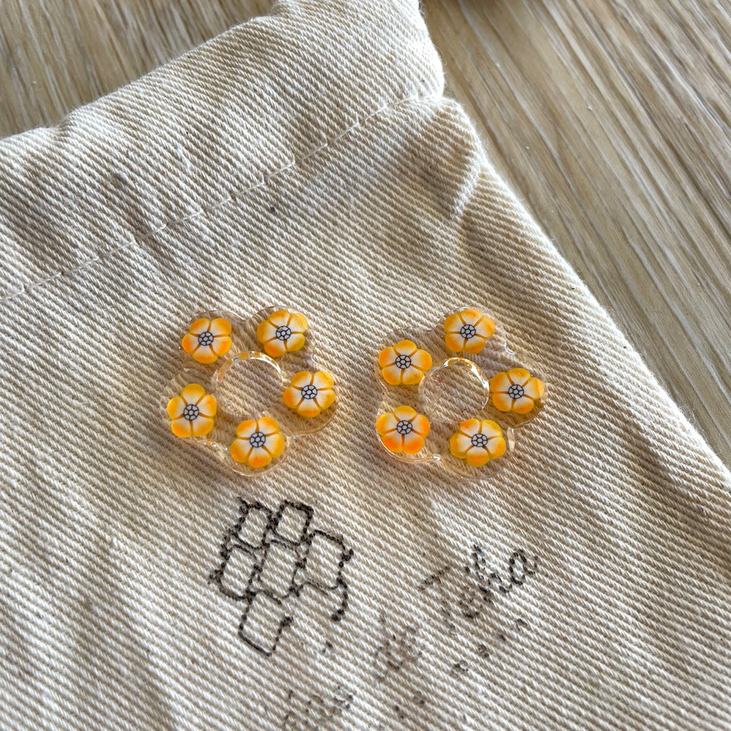 Pampilles fleurs avec ou sans créoles en acier inoxydable modèle Flower power