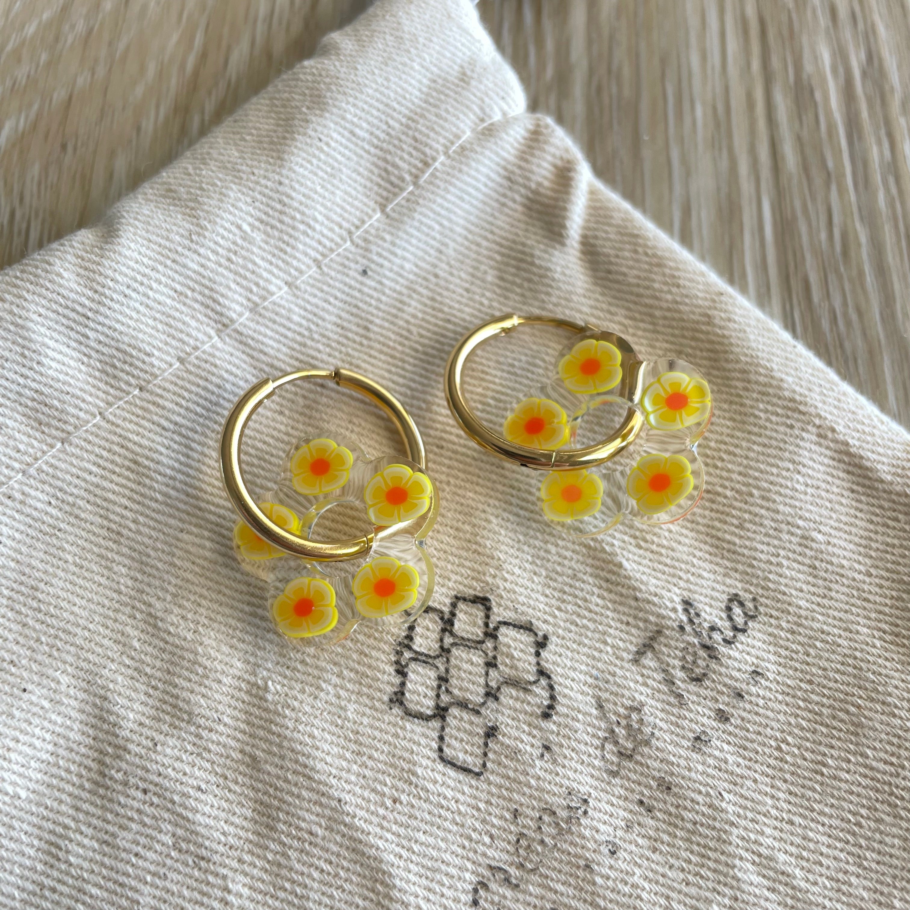 Pampilles fleurs avec ou sans créoles en acier inoxydable modèle Flower power