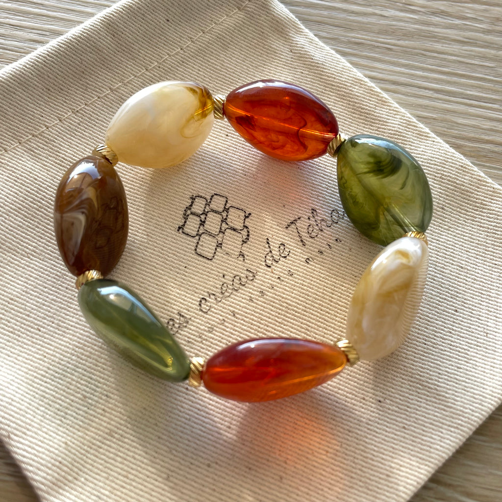 Bracelet élastique en perles acrylique et acier inoxydable modèle Joia