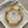 Bracelet élastique tendance perles incurvées modèle Ata