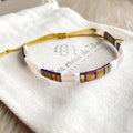 Bracelet fin en perles de verre, saumon, blanc, bordeaux doré modèle Huira