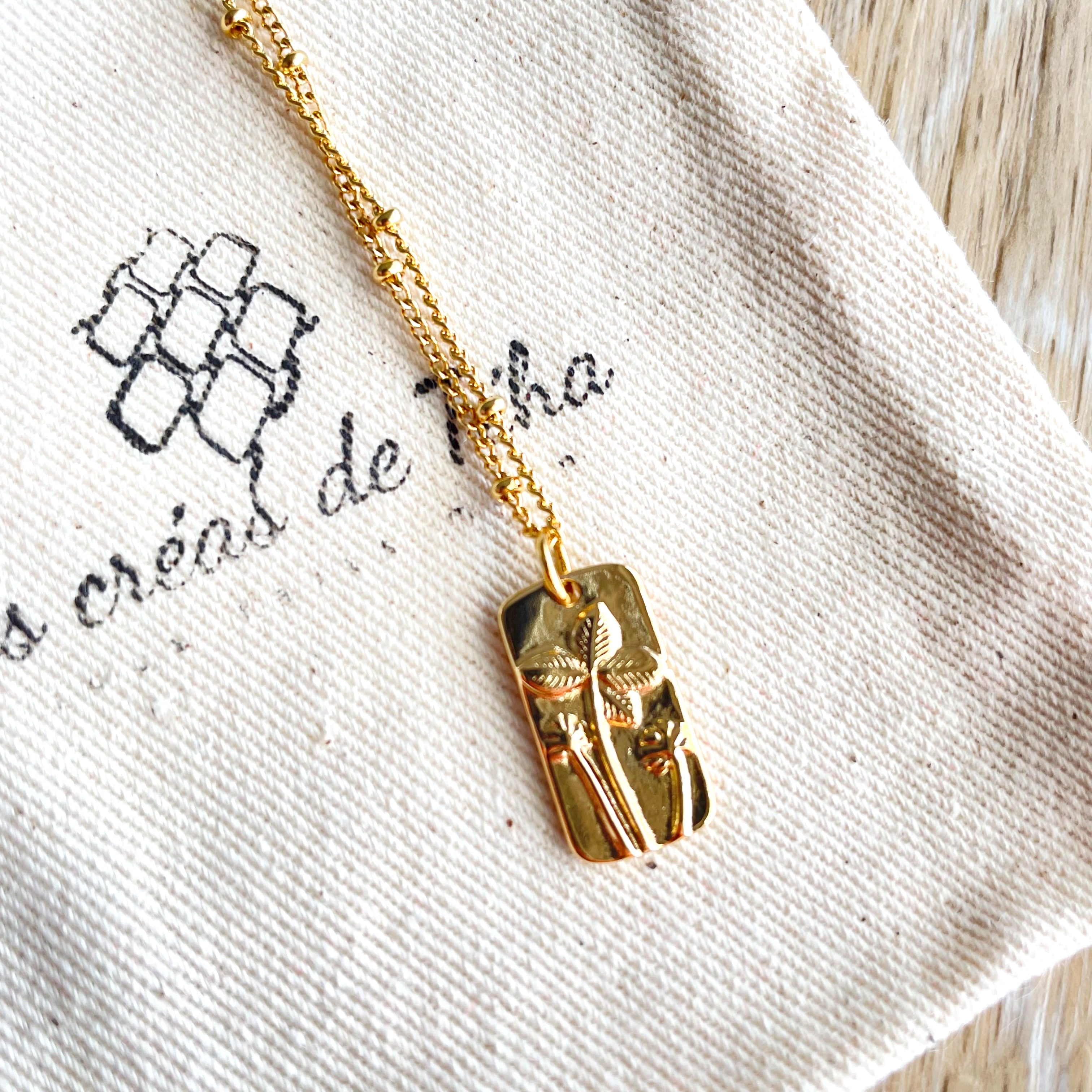 Collier en acier inoxydable et plaqué or  modèle Printemps