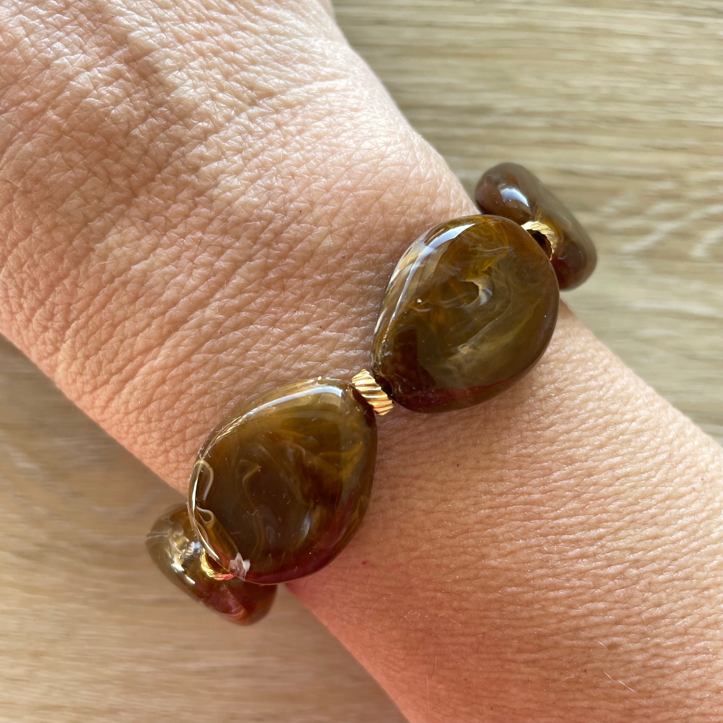 Bracelet élastique en perles acrylique et acier inoxydable modèle Joia