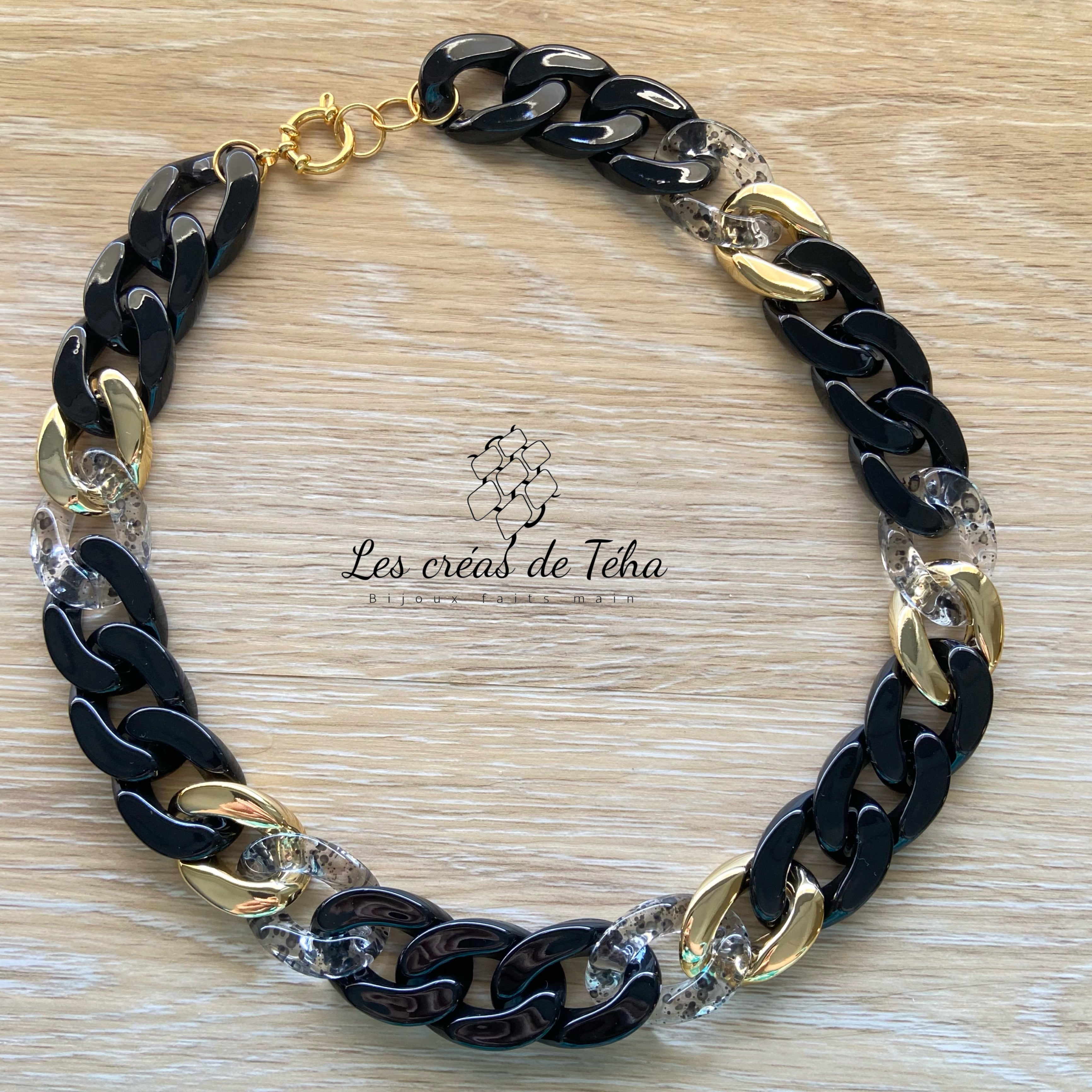 Collier en grosses mailles en acrylique et acier inoxydable noir et doré