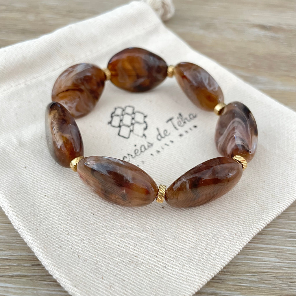 Bracelet élastique en perles acrylique et acier inoxydable modèle Joia