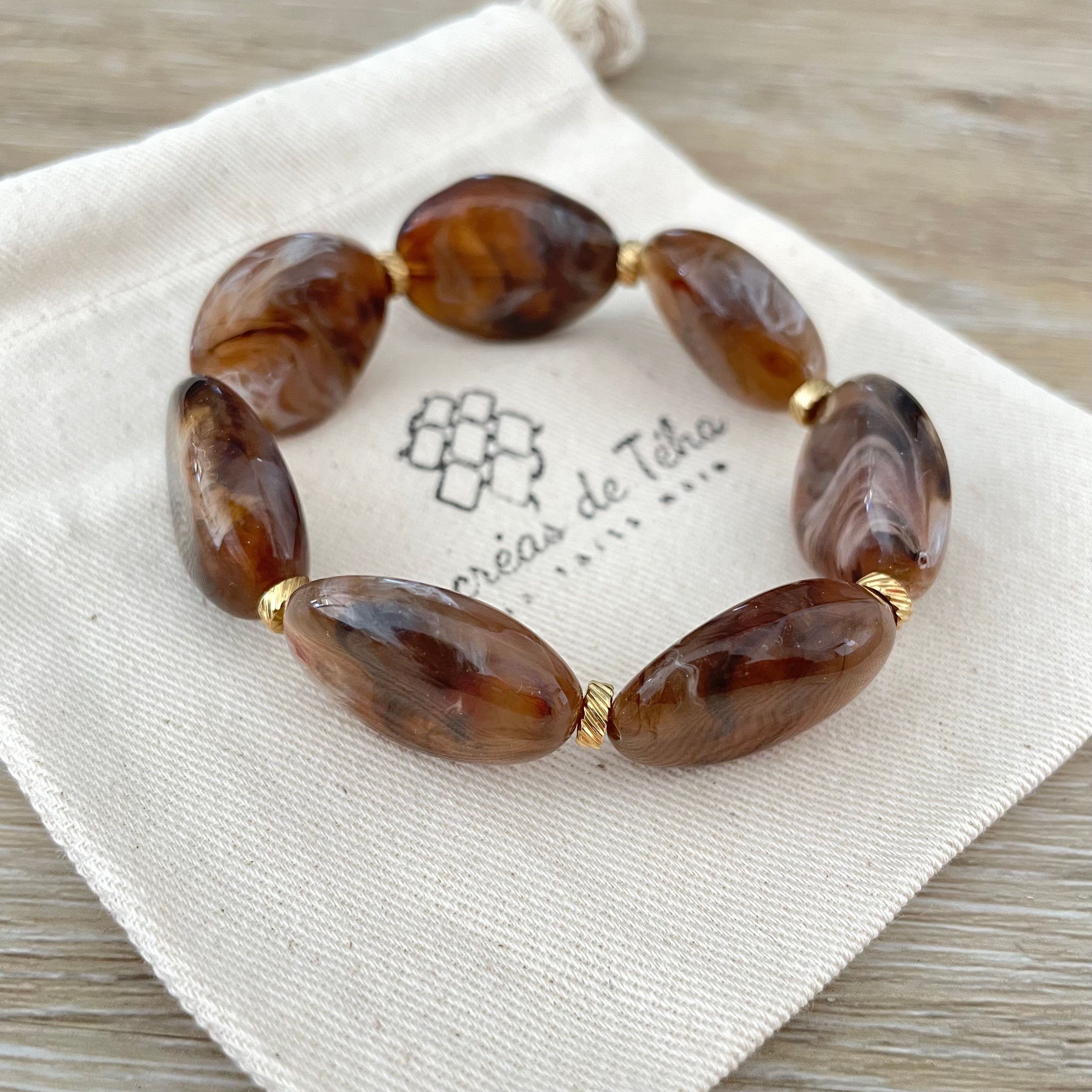 Bracelet élastique en perles acrylique et acier inoxydable modèle Joia
