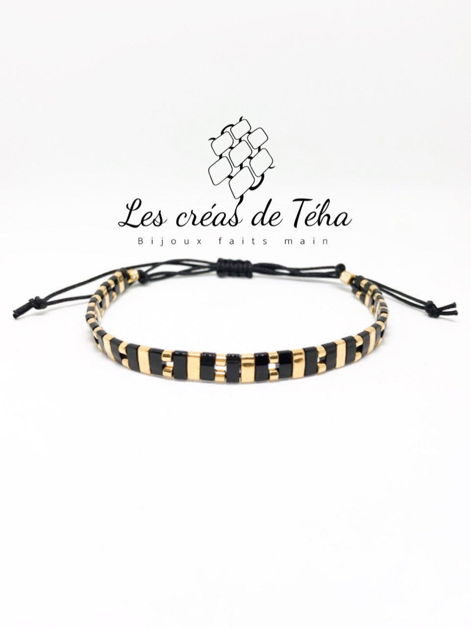 Bracelet Huira noir et doré en perles de verre et cordon