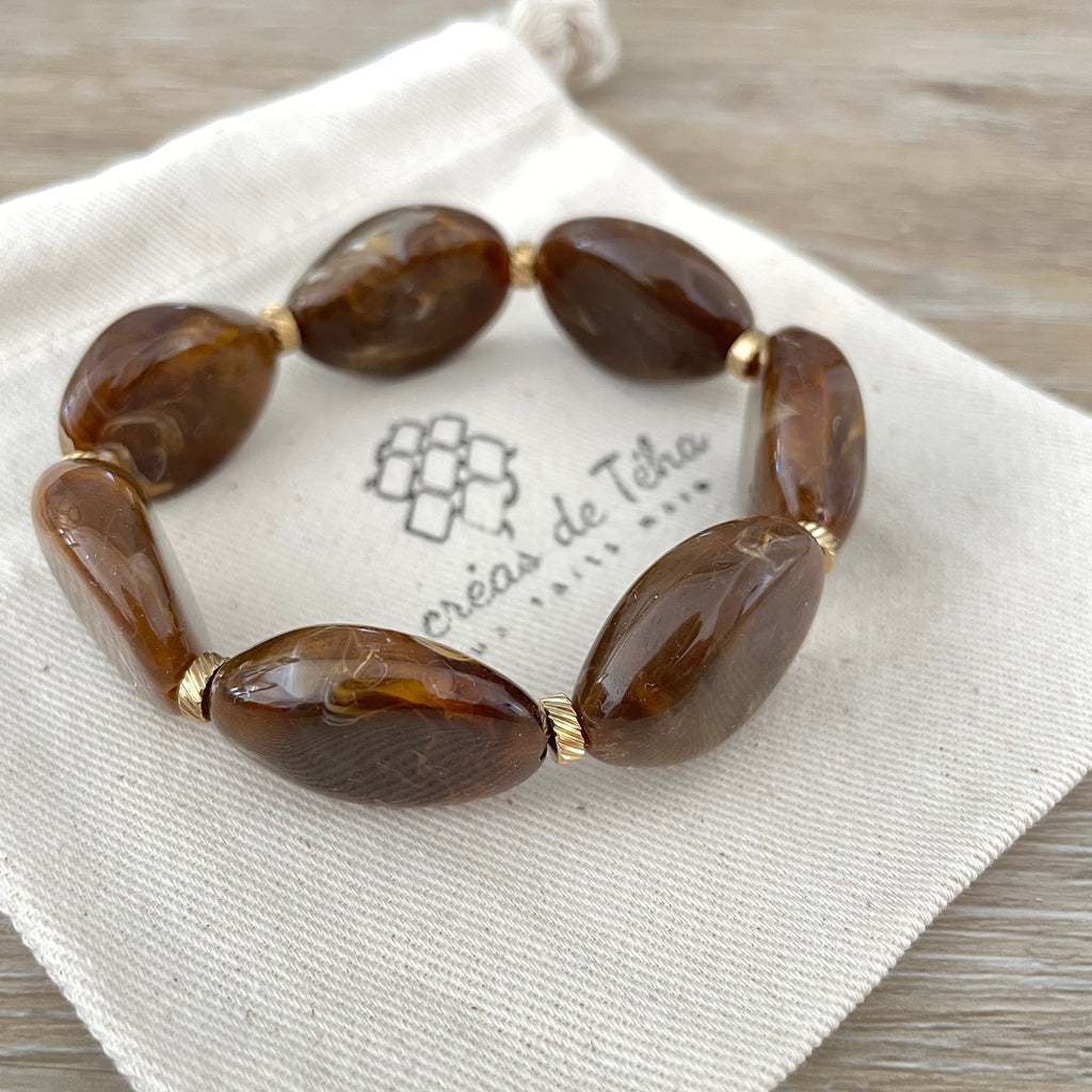 Bracelet élastique en perles acrylique et acier inoxydable modèle Joia