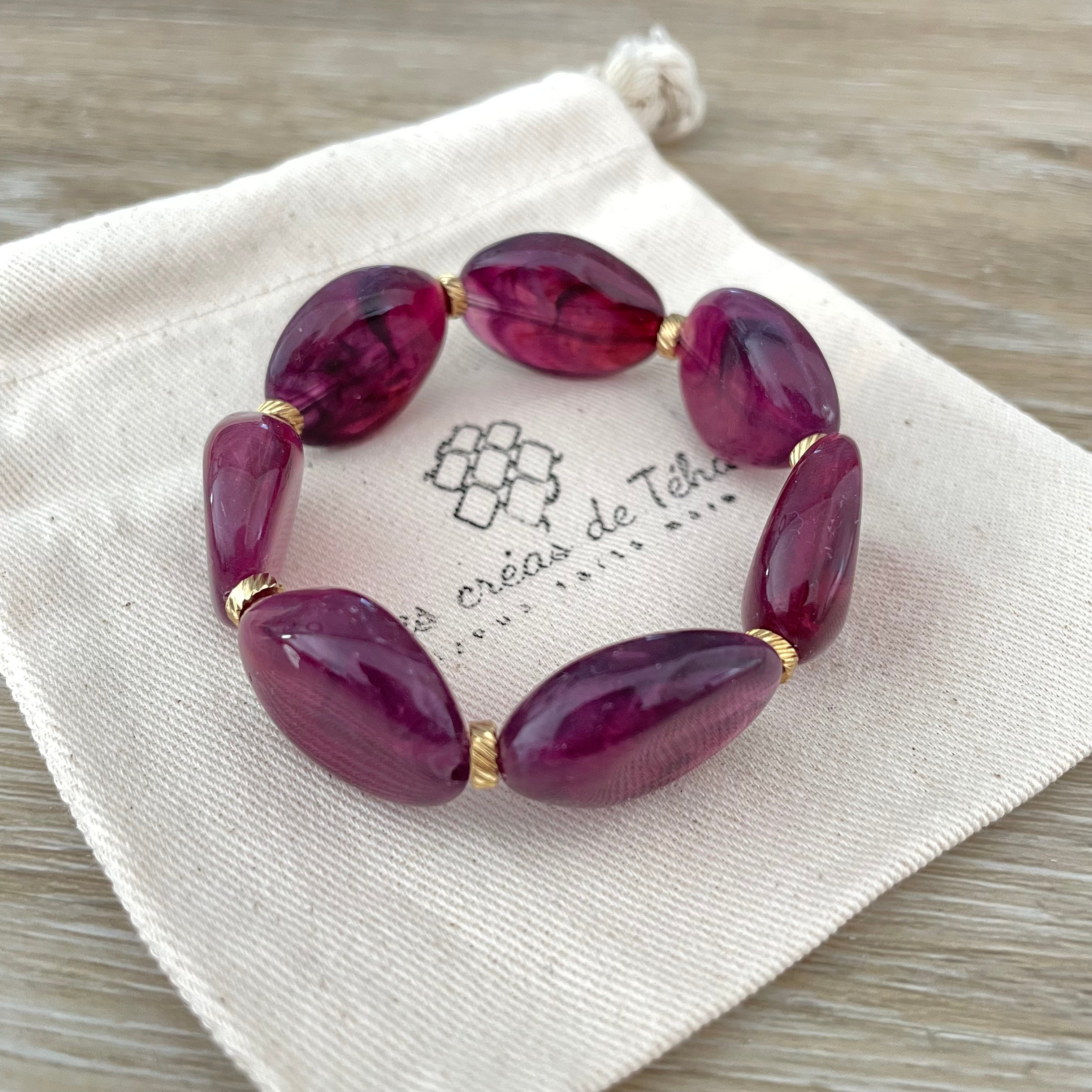 Bracelet élastique en perles acrylique et acier inoxydable modèle Joia