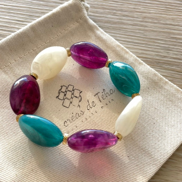 Bracelet élastique en perles acrylique et acier inoxydable modèle Joia