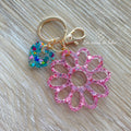 Porte-clés bijou de sac avec breloque fleur en résine modèle Flower