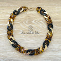 Collier en grosses mailles en acrylique et acier inoxydable