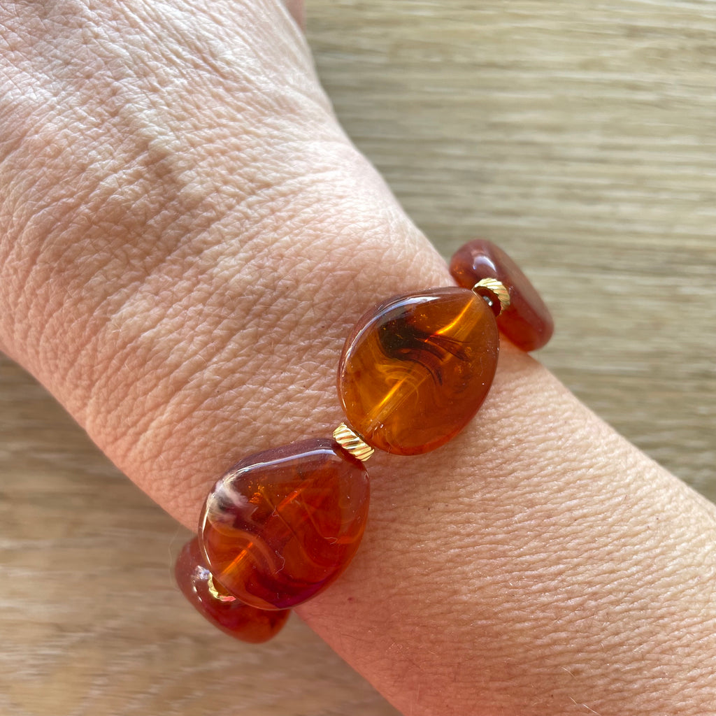 Bracelet élastique en perles acrylique et acier inoxydable modèle Joia