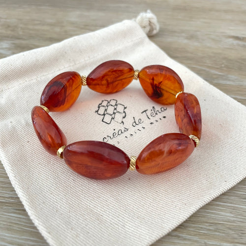 Bracelet élastique en perles acrylique et acier inoxydable modèle Joia
